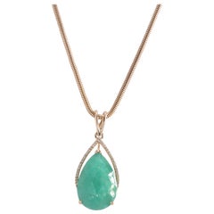 15.5 Carat Natural Colombian Emerald .21 Carat Total Diamond Pendant 8.1 Grams