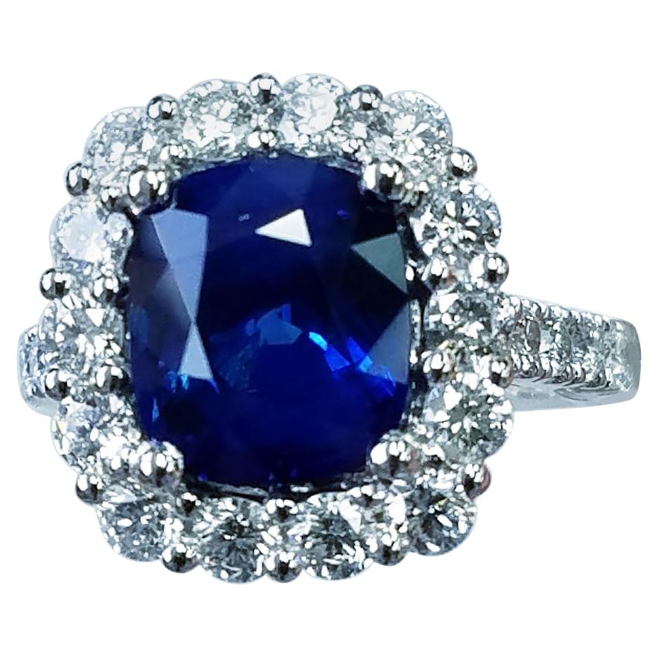 Platinum Cushion Cut Blue Sapphire and Diamond Ring For Sale
