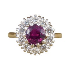 1940s Ruby and Diamond Cluster Ring in 18 Carat Yellow Gold and Platinum