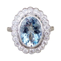 Vintage Contemporary 1.90 Carat Aquamarine and Diamond Halo Cluster Ring in Platinum