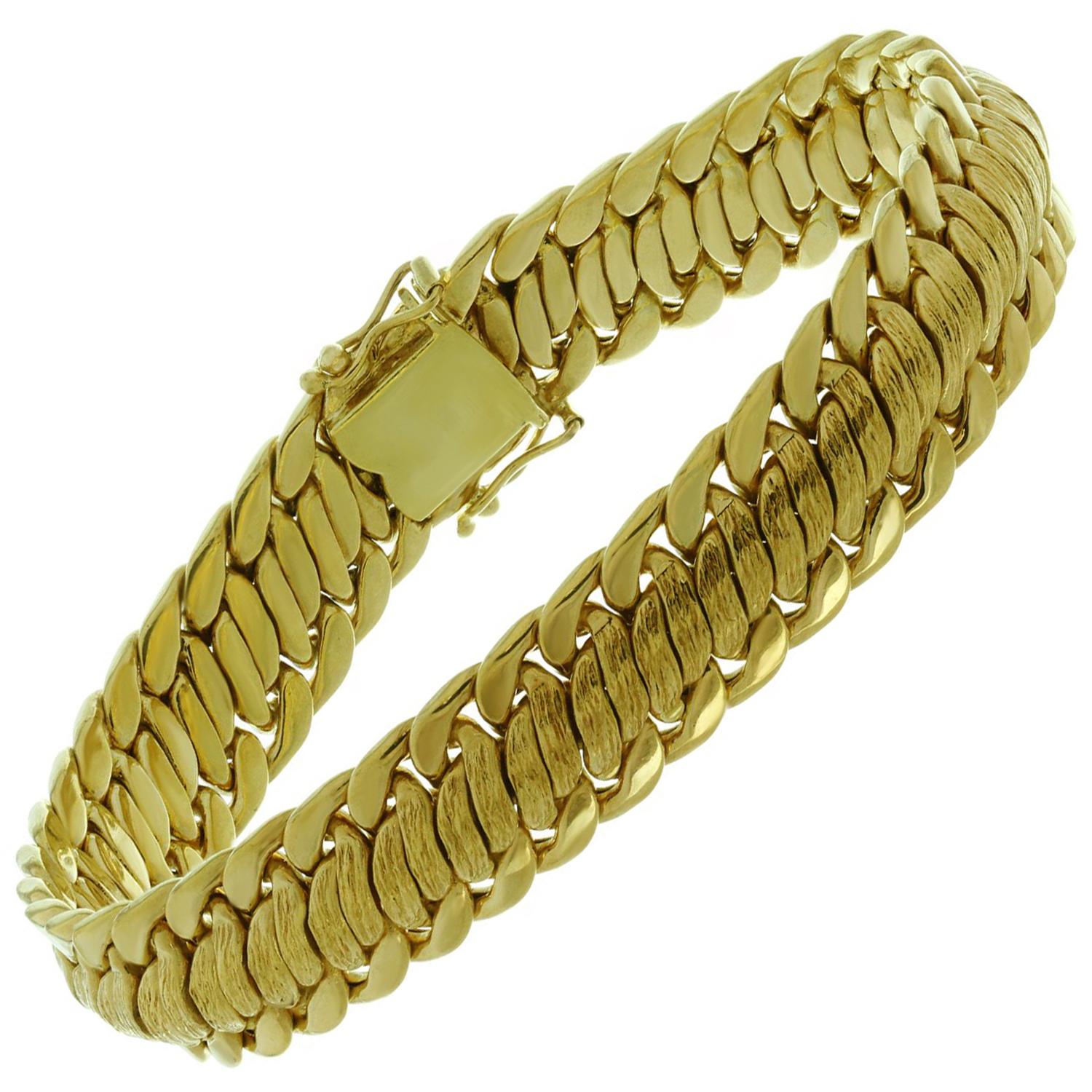 Bracelet tressé vintage en or jaune massif 18k. 