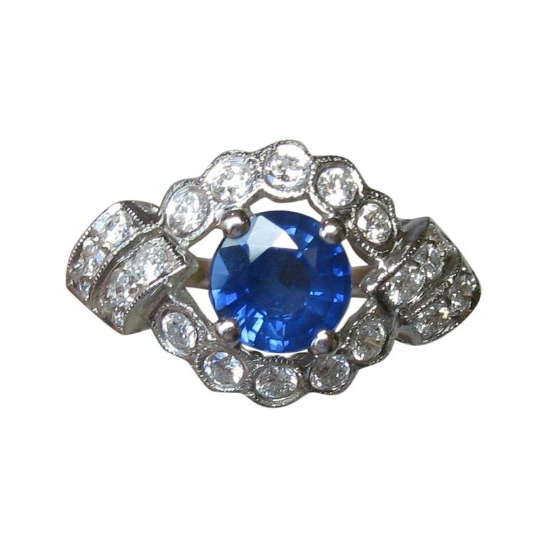 1.14 Carat Sapphire 22 Diamond Platinum Wedding Engagement Ring UGL Certified For Sale