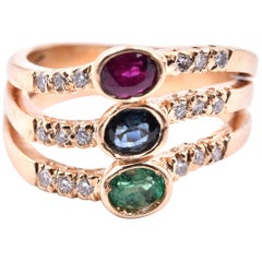 Ring aus 14 Karat Gelbgold mit Smaragd, Saphir, Rubin und Diamant