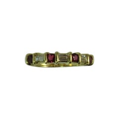 Vintage 18 Karat Yellow Gold Band Ring with Round Rubies and Baguettes