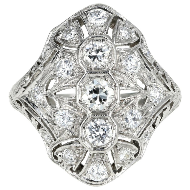 Art Deco Platinum .60 Carat Diamond Shield Ring at 1stDibs