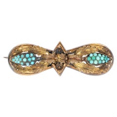 Antique Victorian Hourglass Form 14 Karat Gold Filigreed Brooch with Inlaid Turquoise