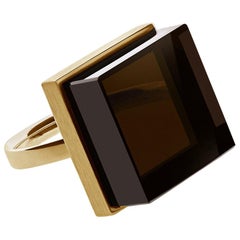 Anillo de oro rosa de dieciocho quilates estilo art déco con cuarzo ahumado del artista