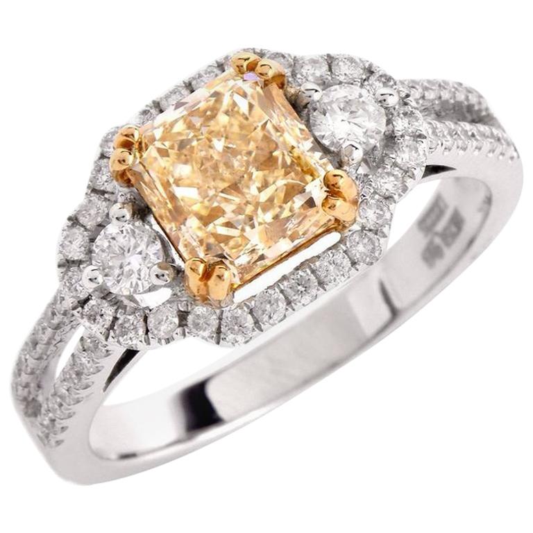 Fancy Light Yellow Diamond White Gold Engagement Ring