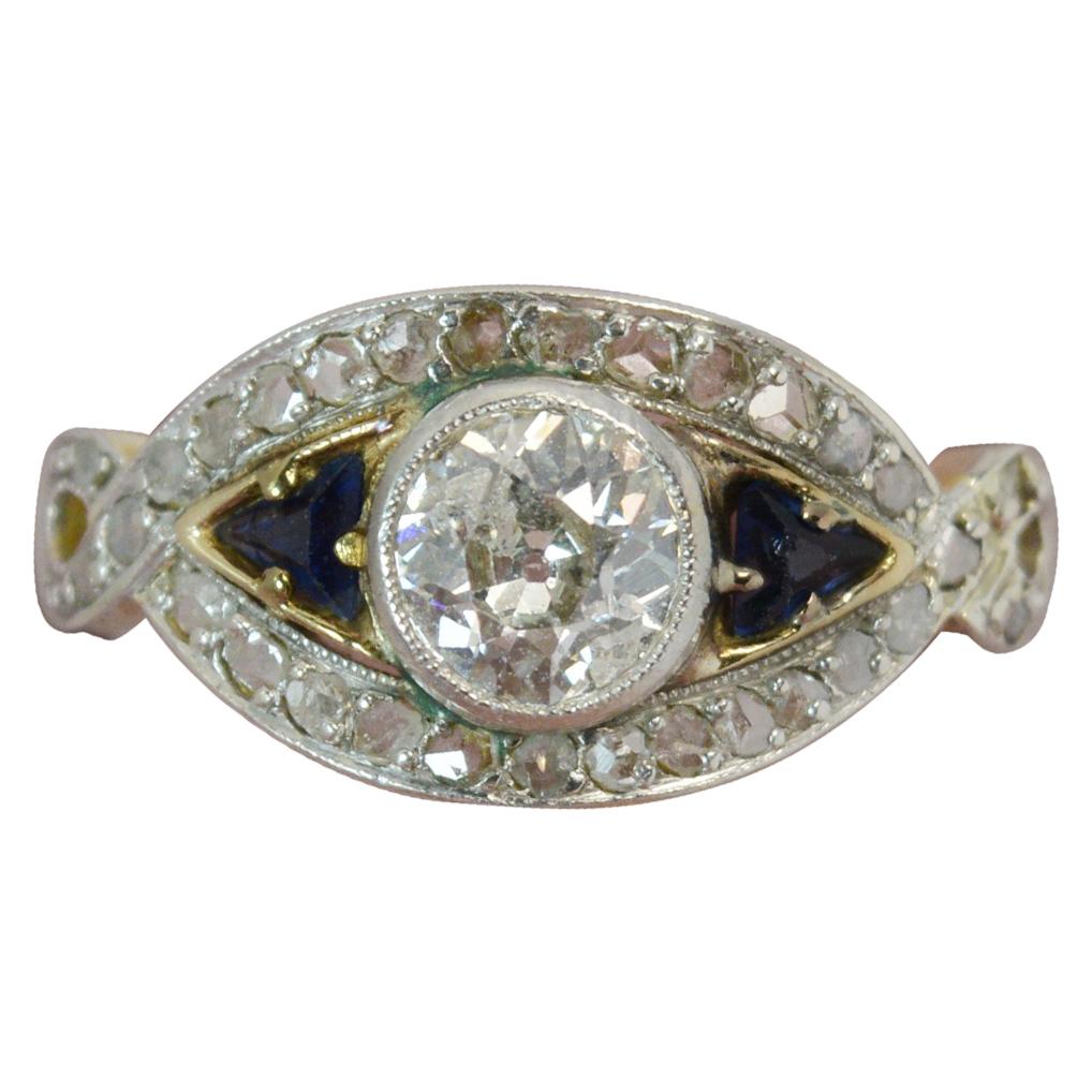 Art Deco 1.00 Carat Old Cut Diamond and Sapphire 18 Carat Gold and Platinum Ring