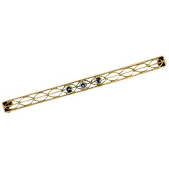 Antique 10 Karat Yellow Gold, Bar Pin or Brooch Set with 3-Round Sapphires