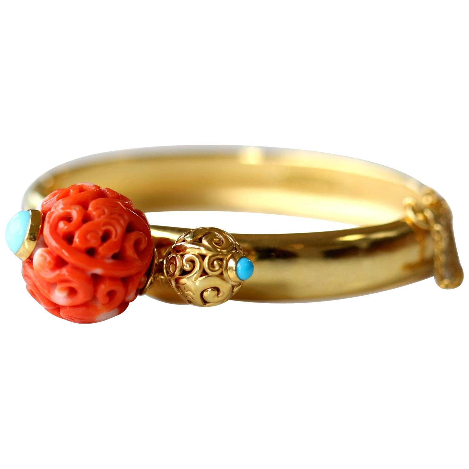 Antique Chinese Carved Coral Bead on a Gold Bangle