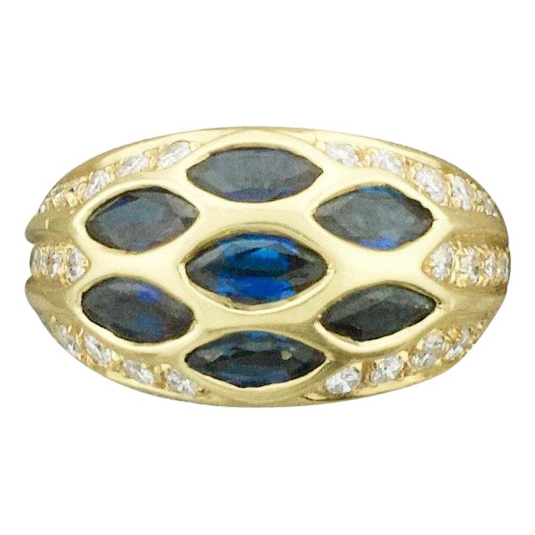 Darling Sapphire and Diamond Ring in 18 Karat Signed "Riviere & Cie." For Sale