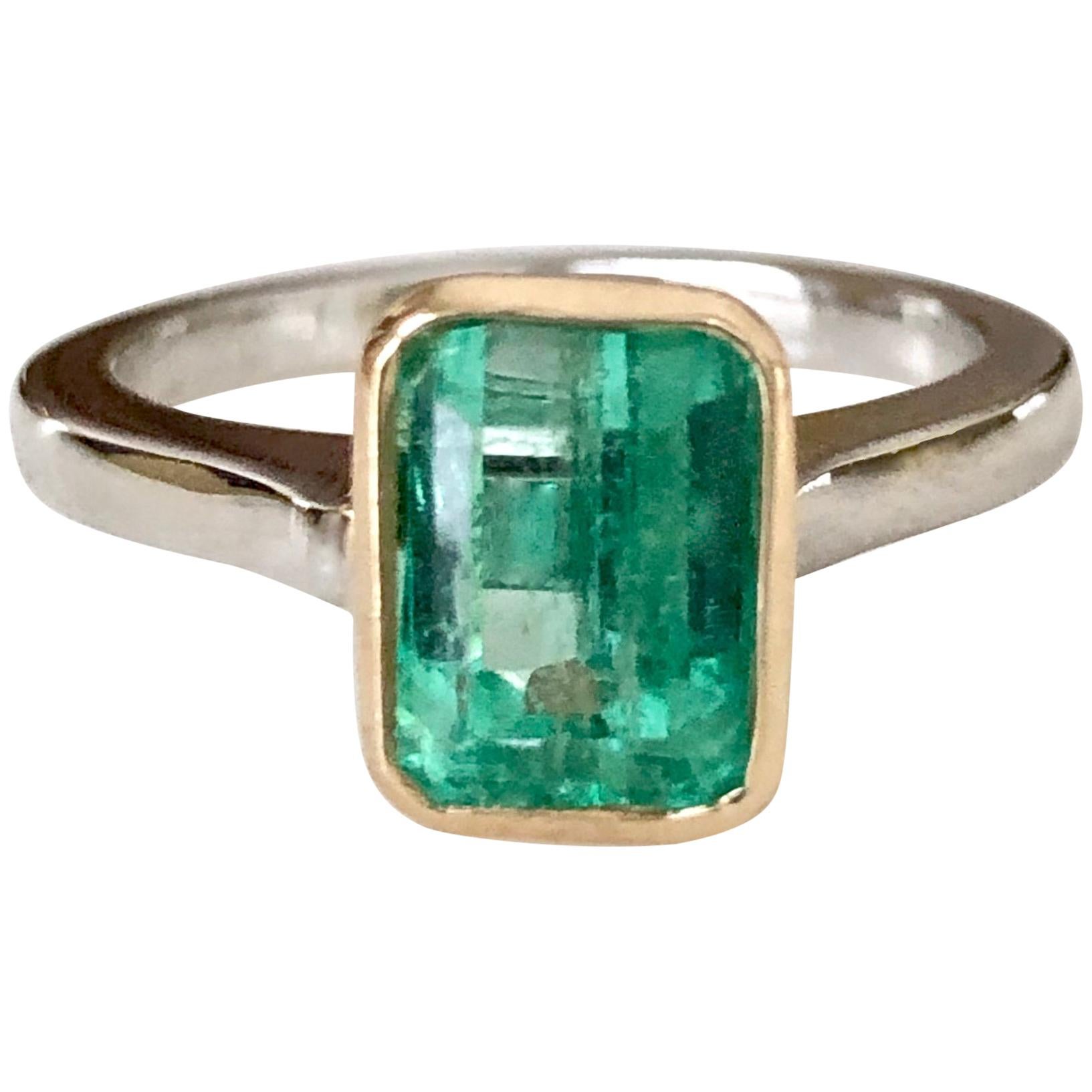Estate Solitaire Emerald 18 Karat Platinum Engagement Ring
