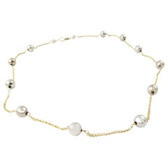 Collier de perles en or jaune et blanc 18 carats