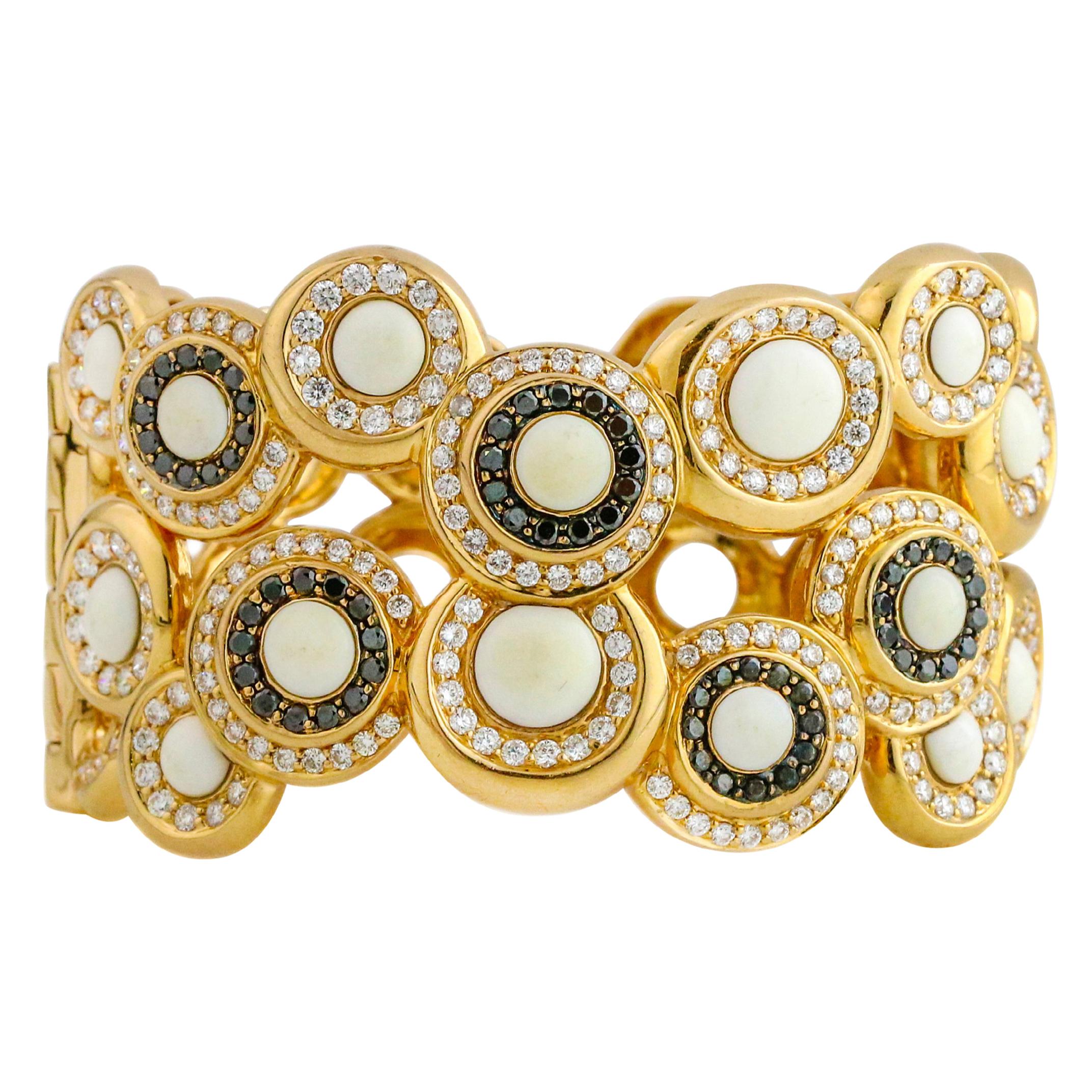 5.25 Carat 18 Karat Yellow Gold White Coral Black Diamond Hinged Cuff Bracelet For Sale