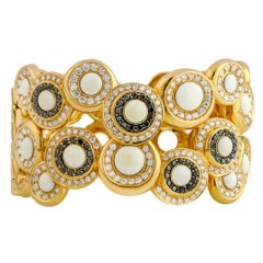 5.25 Carat 18 Karat Yellow Gold White Coral Black Diamond Hinged Cuff Bracelet