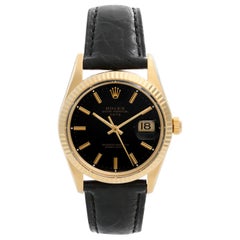 Vintage Rolex Date Men's 14 Karat Yellow Gold Watch on a Strap 15037
