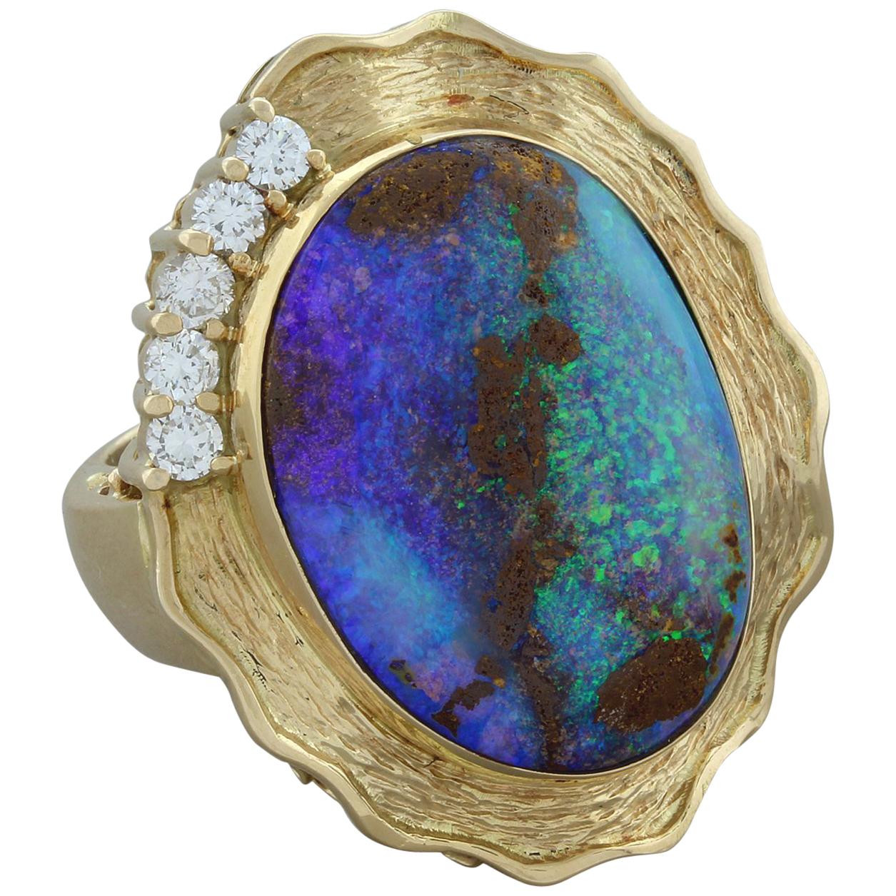 Goldring mit Boulder-Opal und Diamant