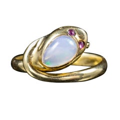 Antique Victorian Opal Snake Ring 18 Carat Gold Ruby Eyes, circa 1900