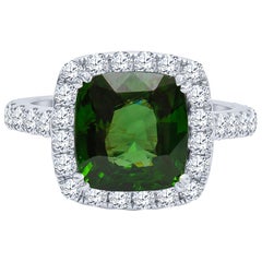 5.42 Carat Cushion Cut Green Zircon Ring with 0.52 Carat Total Diamond Halo