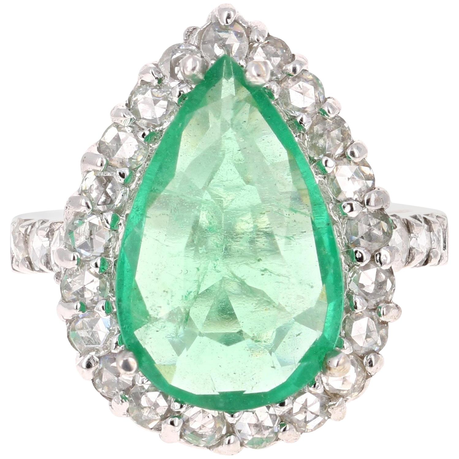 5.67 Carat Pear Cut Emerald Diamond 14 Karat White Gold Vintage Ring For Sale