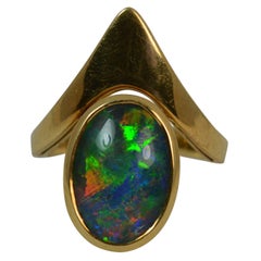 Impressive 18 Carat Gold and Colourful Opal Triplet Solitaire Wishbone Ring
