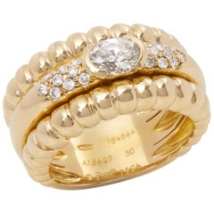 Piaget 18 Karat Yellow Gold Oval & Round Cut Diamond Dress Band Ring
