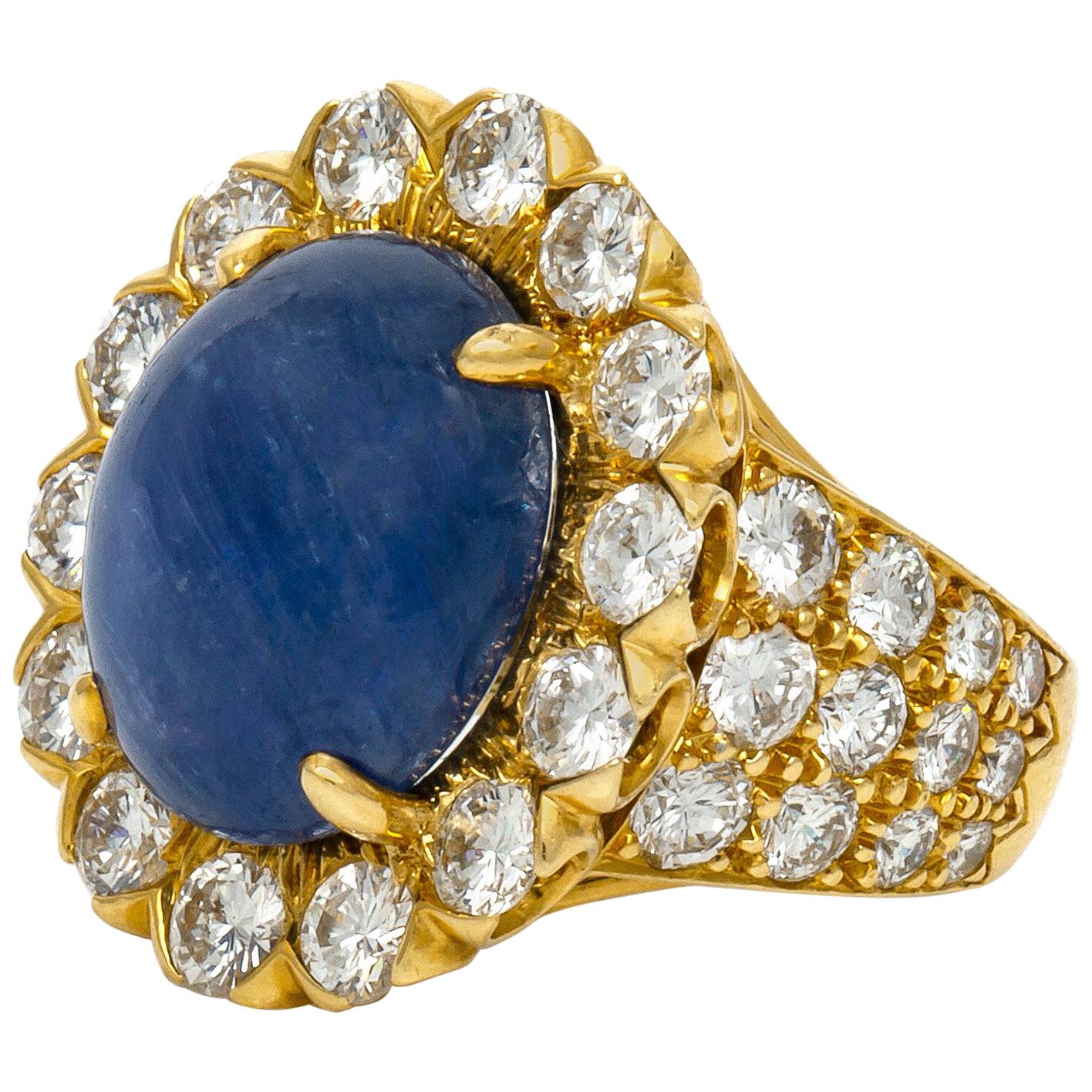 Finely crafted in 18k yellow and white gold with a Cabochon Sapphire weighing approximately 10.00 carats.
The ring features round brilliant cut diamonds weighingapproximately a total of 10.00 carats.
Signed by David Webb
Size 6, resizable
Circa 1970s