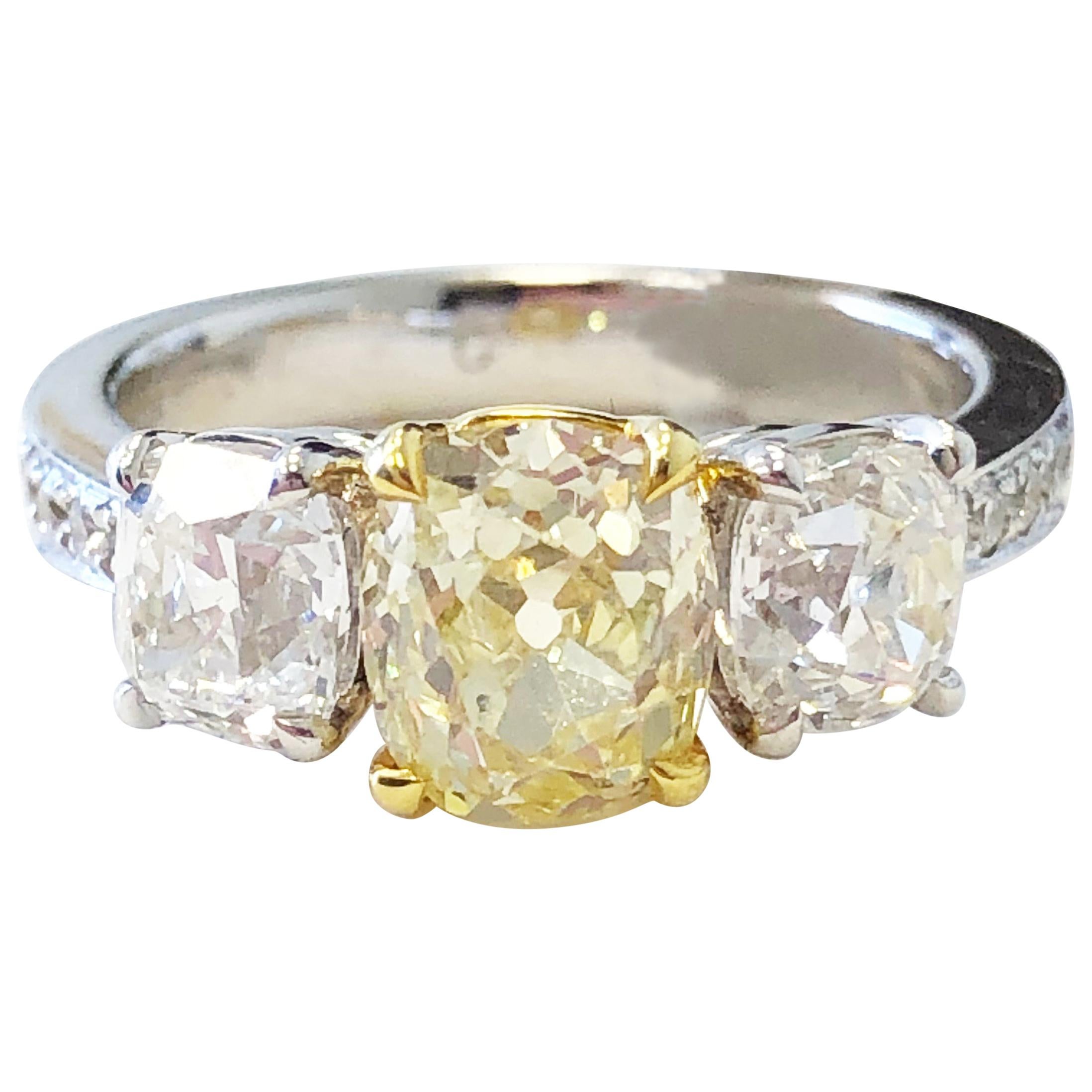 GIA Fancy Yellow Diamond Cushion and White Diamond 3 Stone Ring in 18k Gold 