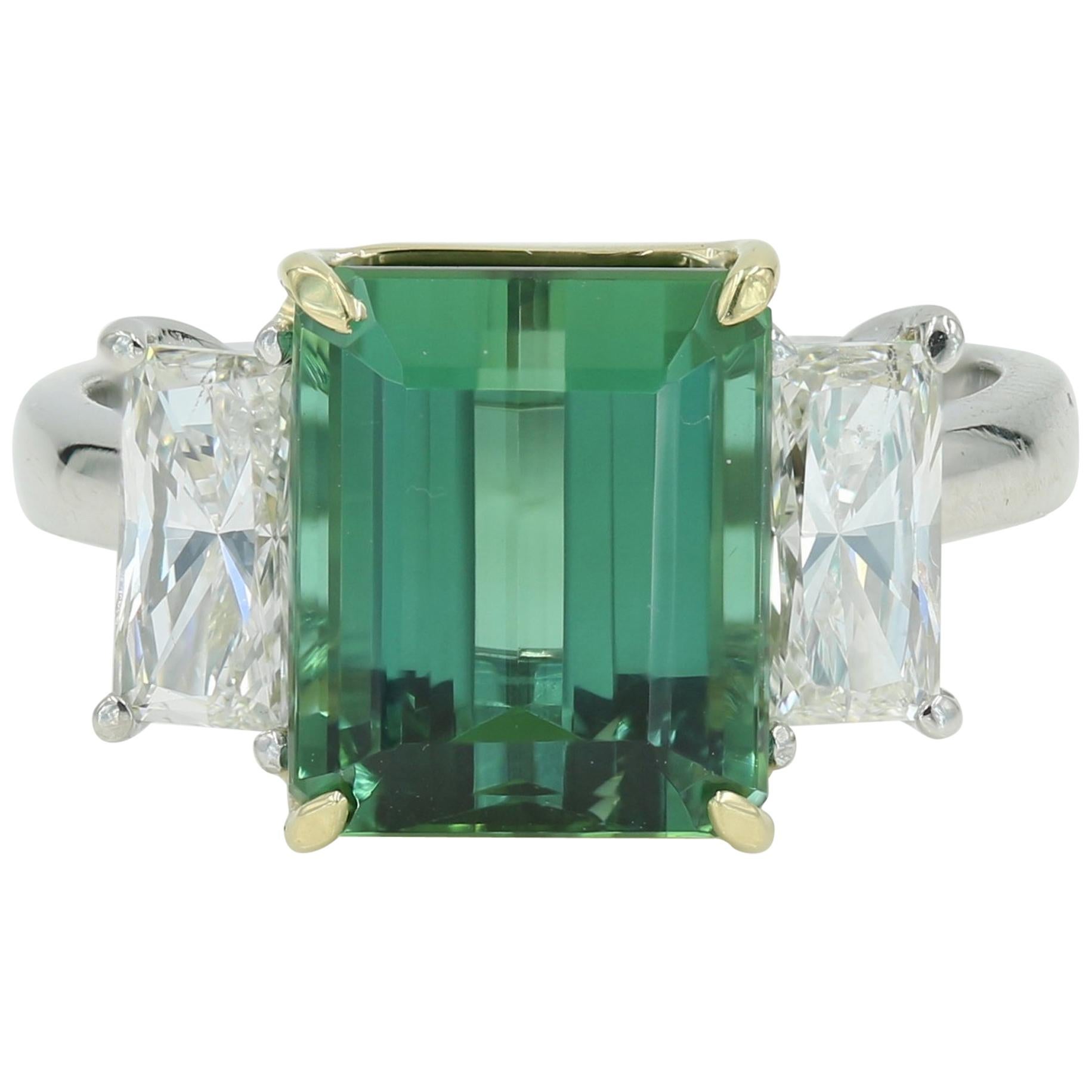 Very fine green Tourmaline in a Platinum & 18kt YG mounting w 2 side diamonds