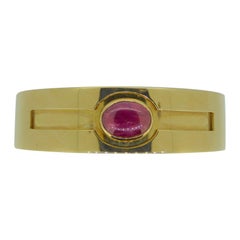 Bulgari Cabochon Ruby and 18 Carat Yellow Gold Hinged Bracelet Bangle