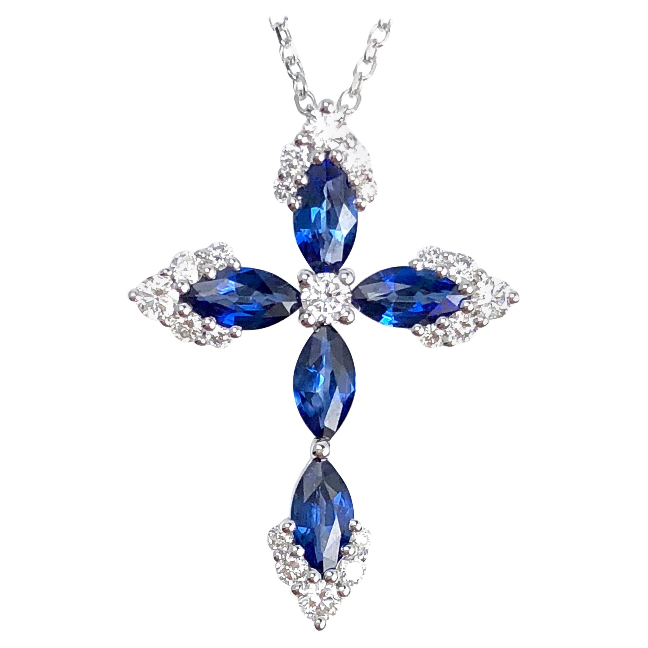 0.79 Carat Vivid Blue Sapphire and 0.23 Carat Diamond Cross Pendant