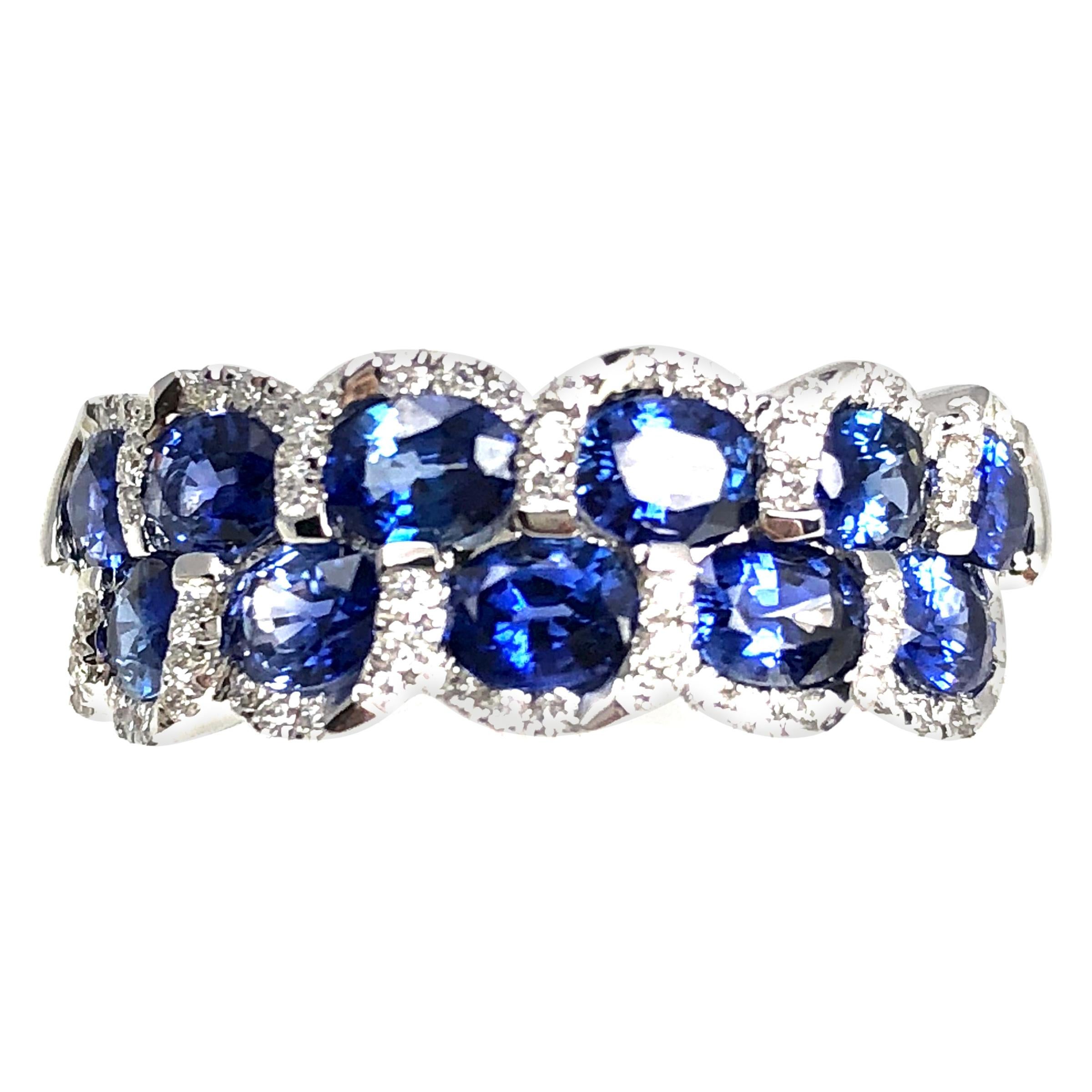 2.33 Carat Oval Cut Fine Sapphire and Diamond Ring in 18 Karat White Gold