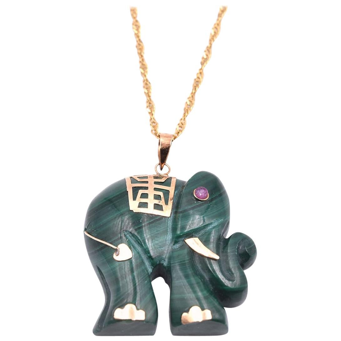 14 Karat Yellow Gold Carved Jade Elephant