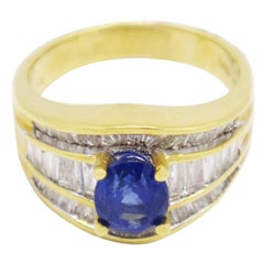 Vintage 18 Karat Gold 2.42 Carat Solitaire Sapphire with Baguette Diamonds Ring