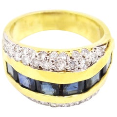 18 Karat Yellow Gold 2.75 Carat Princess Cut Sapphire with Diamonds Ring