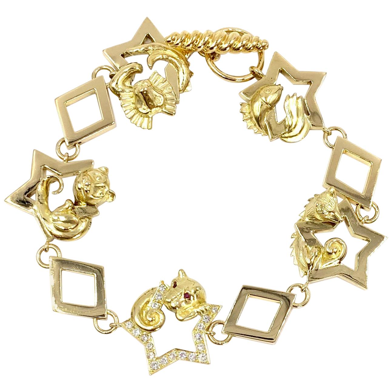 18 Karat Vintage Star Animal Charm Bracelet with Diamonds and Rubies