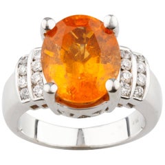 Bague en or blanc certifié AIG avec grenat spessartite de 8,16 carats et diamants