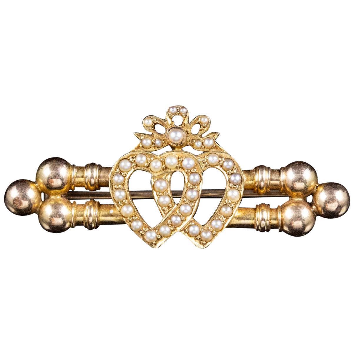 Antique Victorian Pearl Entwined Heart Brooch 18 Carat Gold, circa 1900 For Sale