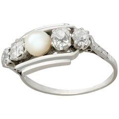 Antique 1940s Pearl and 1.02 Carat Diamond Platinum Cocktail Ring