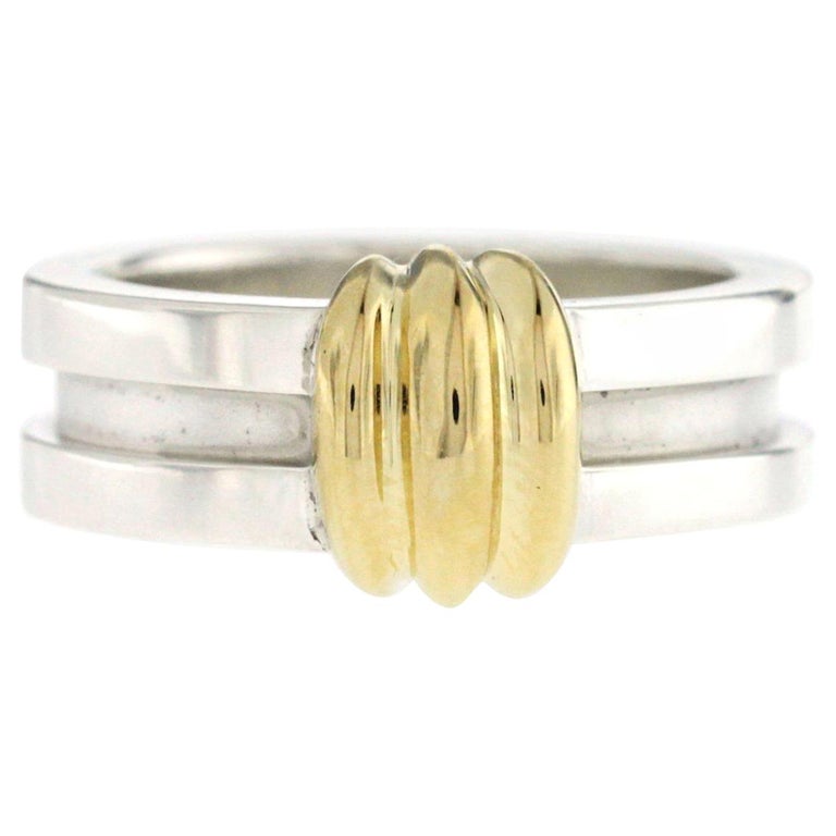 Tiffany and Co. 925 Sterling Silver 18 Karat Gold Atlas Groove Band Ring For Sale at 1stDibs