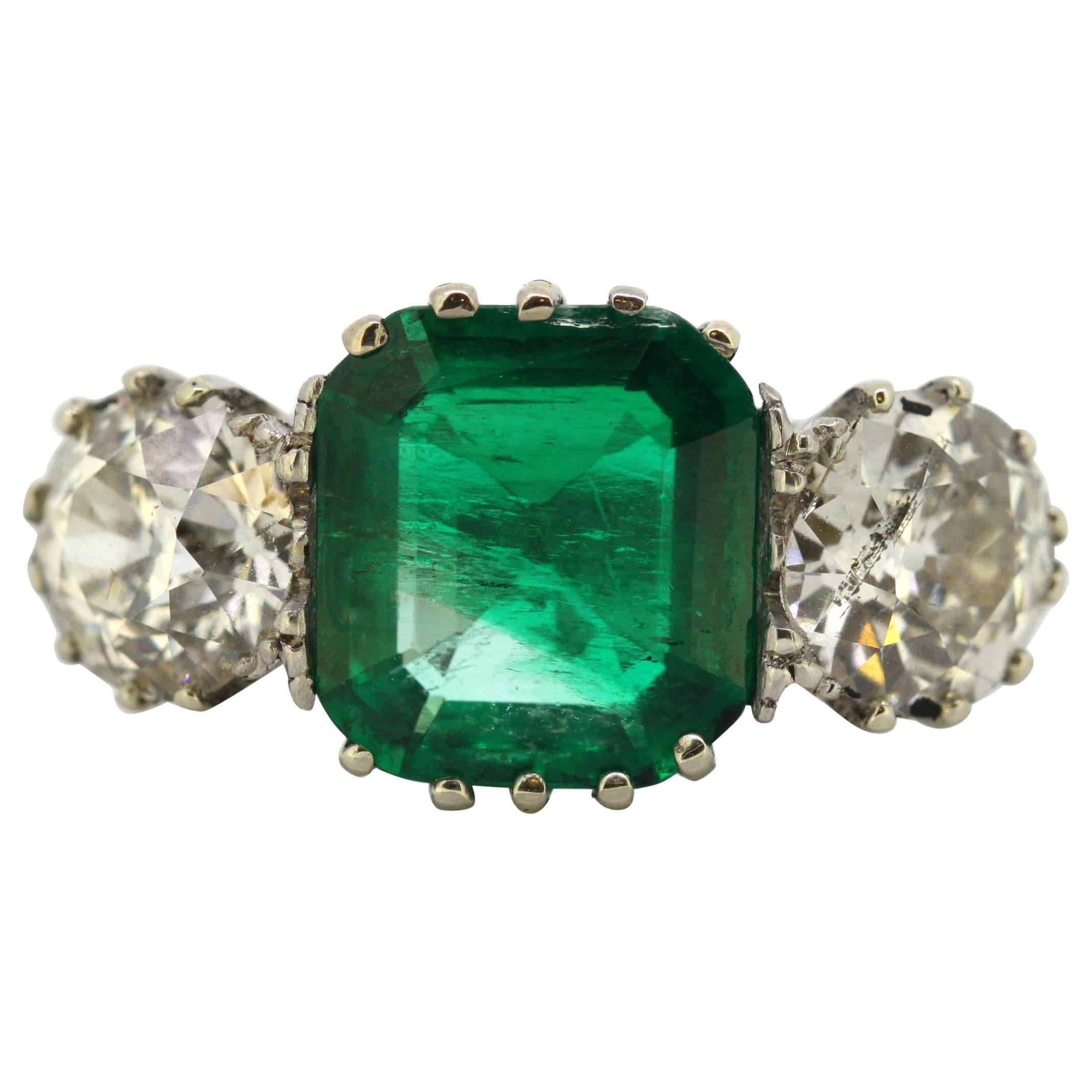 Antique Victorian 18 Karat Gold Three-Stone Emerald and Diamond Ring, England