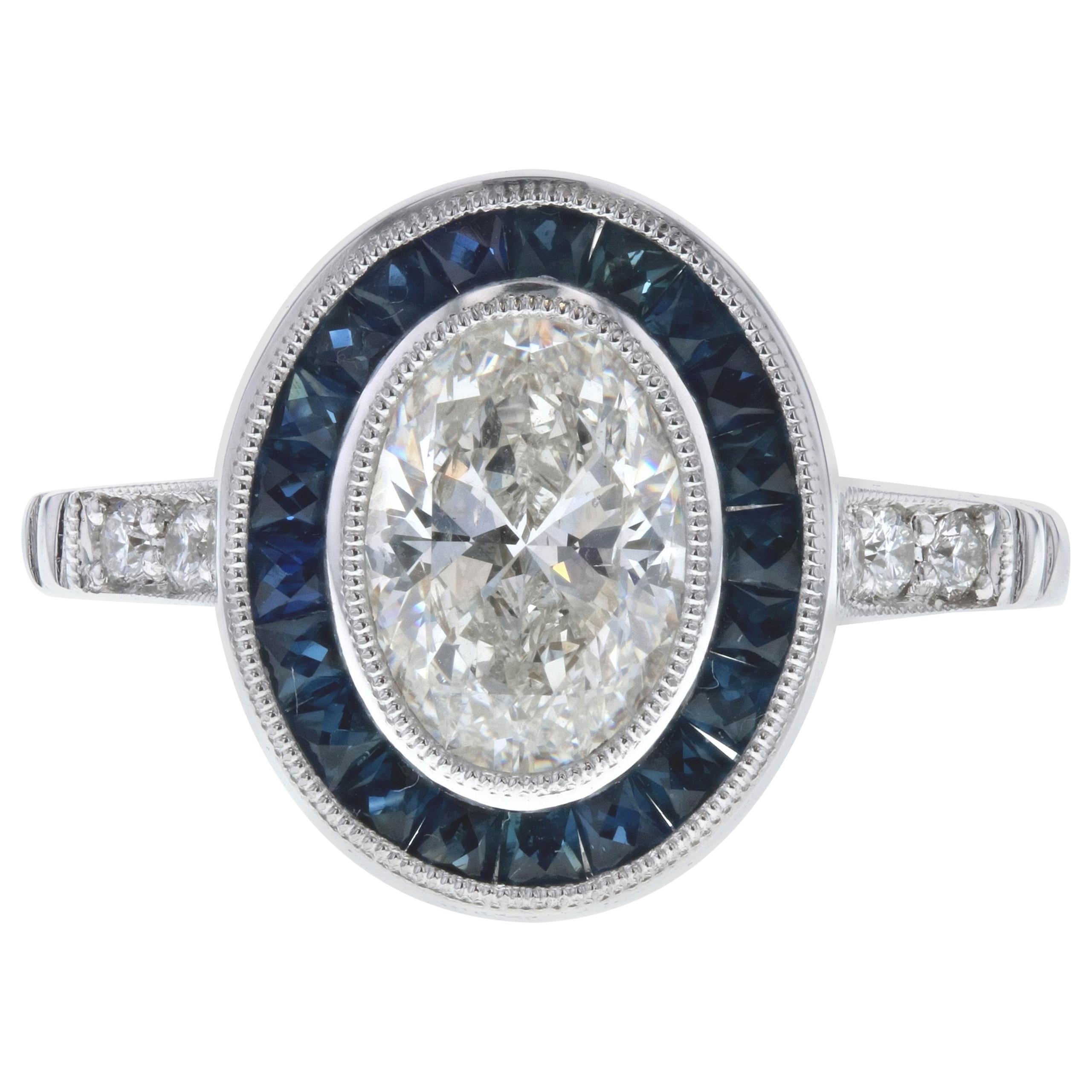 Vintage Inspired Oval Diamond Engagement Ring with Blue Sapphires For Sale