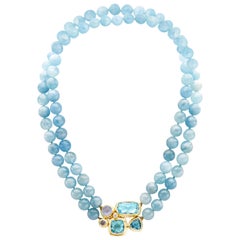 David Yurman, fermoir à plusieurs pierres en or 18 carats et argent sterling avec rangée de topazes bleues