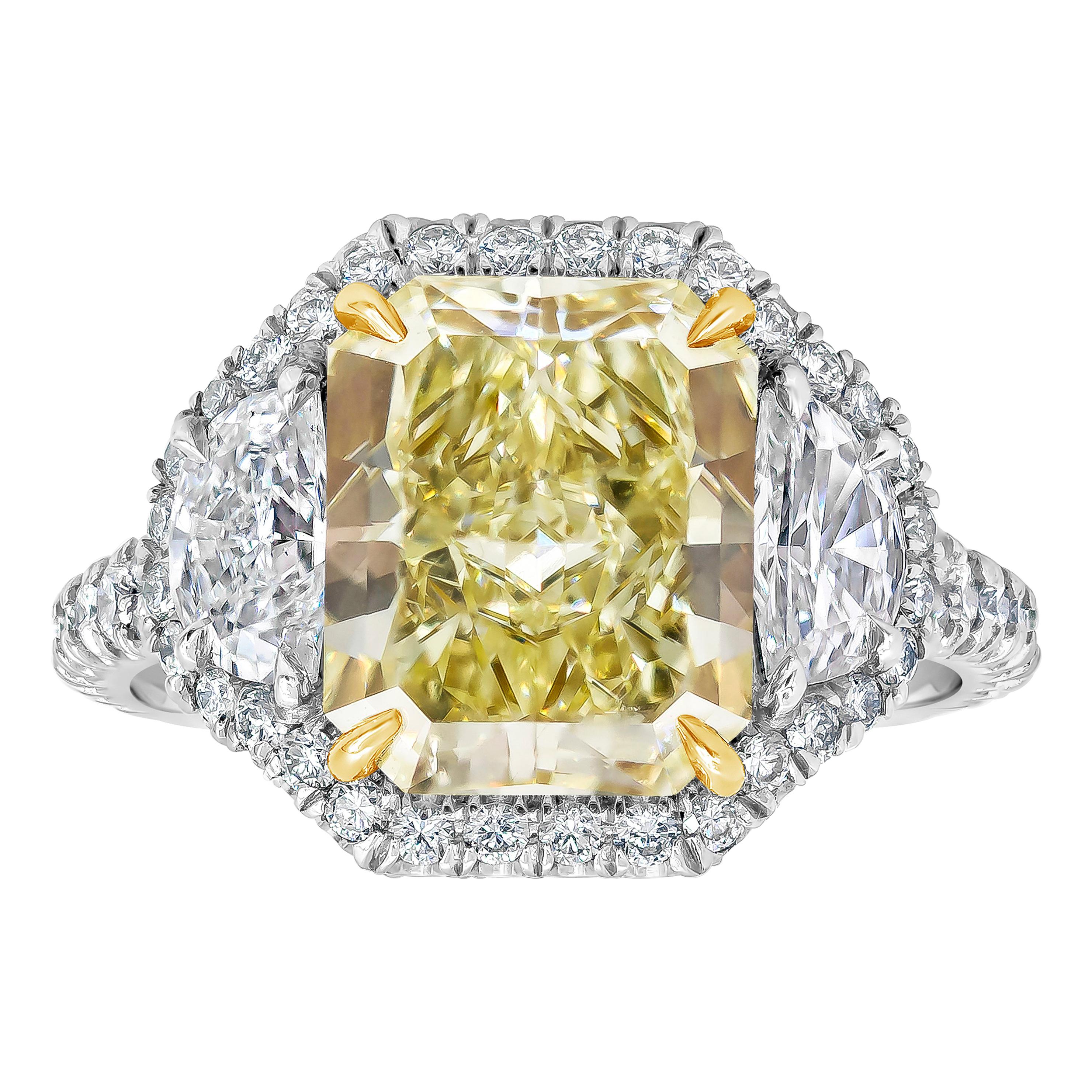 3.64 Carats Total Radiant Cut Yellow Diamond Halo Three-Stone Engagement Ring For Sale