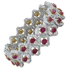 Bracelet en or bicolore à double rangée de diamants et rubis