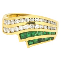 18 Karat Yellow Gold 1.12 Carat Emerald and Diamonds Wave Ring