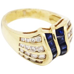 14 Karat Yellow Gold 1.94 Carat Princess Sapphire and Diamonds Ring