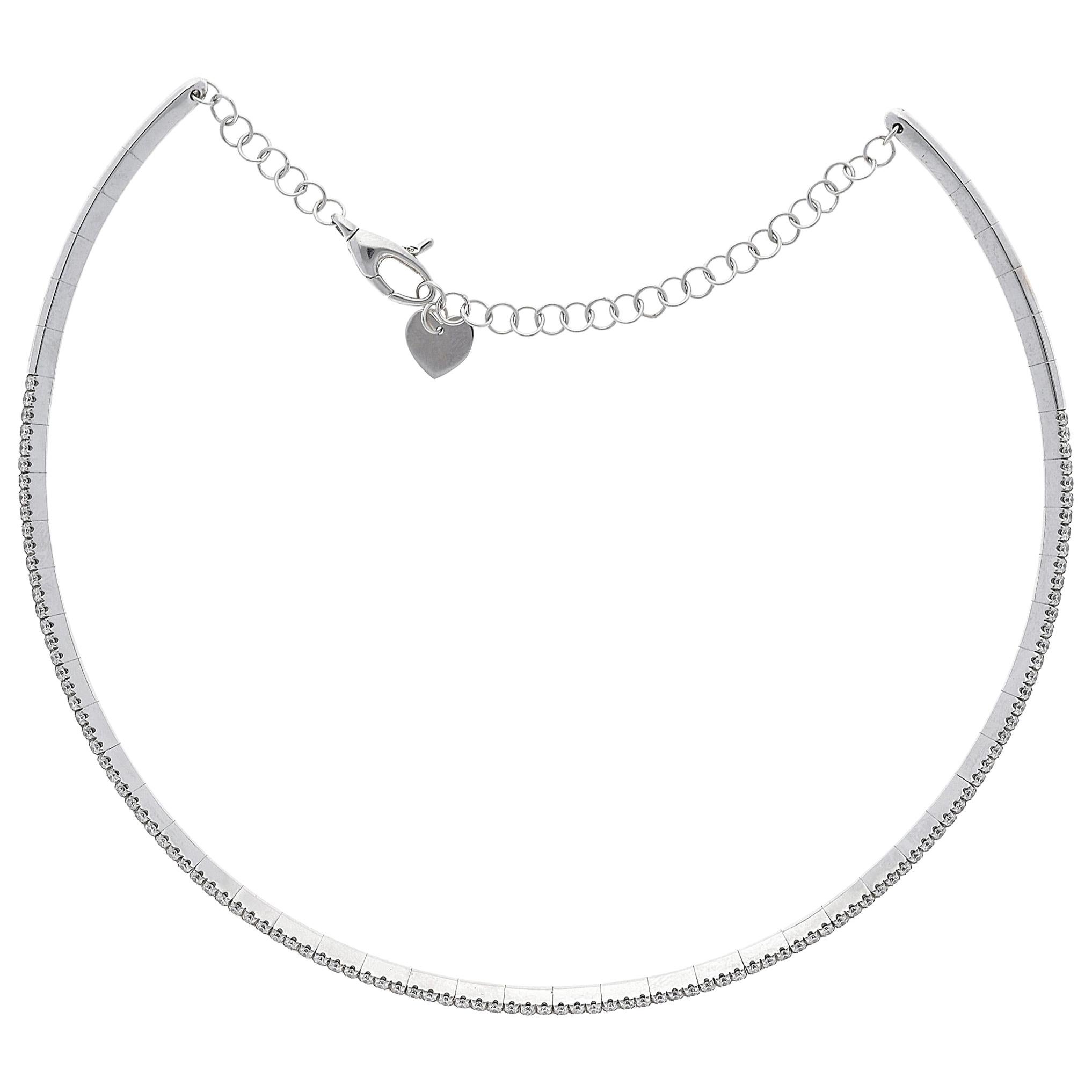 White gold 18 Karat flexible chocker necklace with diamonds.
The necklace has a chain for different neck size.
Total Diamonds Weight: ct. 1.48
Total Weight of 18 Kt Gold: 15.5 grams
Number of Diamonds: n°  111
Diamond characteristics: 
Color: G