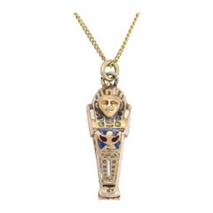 Egyptian Revival, circa 1920 Enamel Sarcophagus and Mummy Pendant